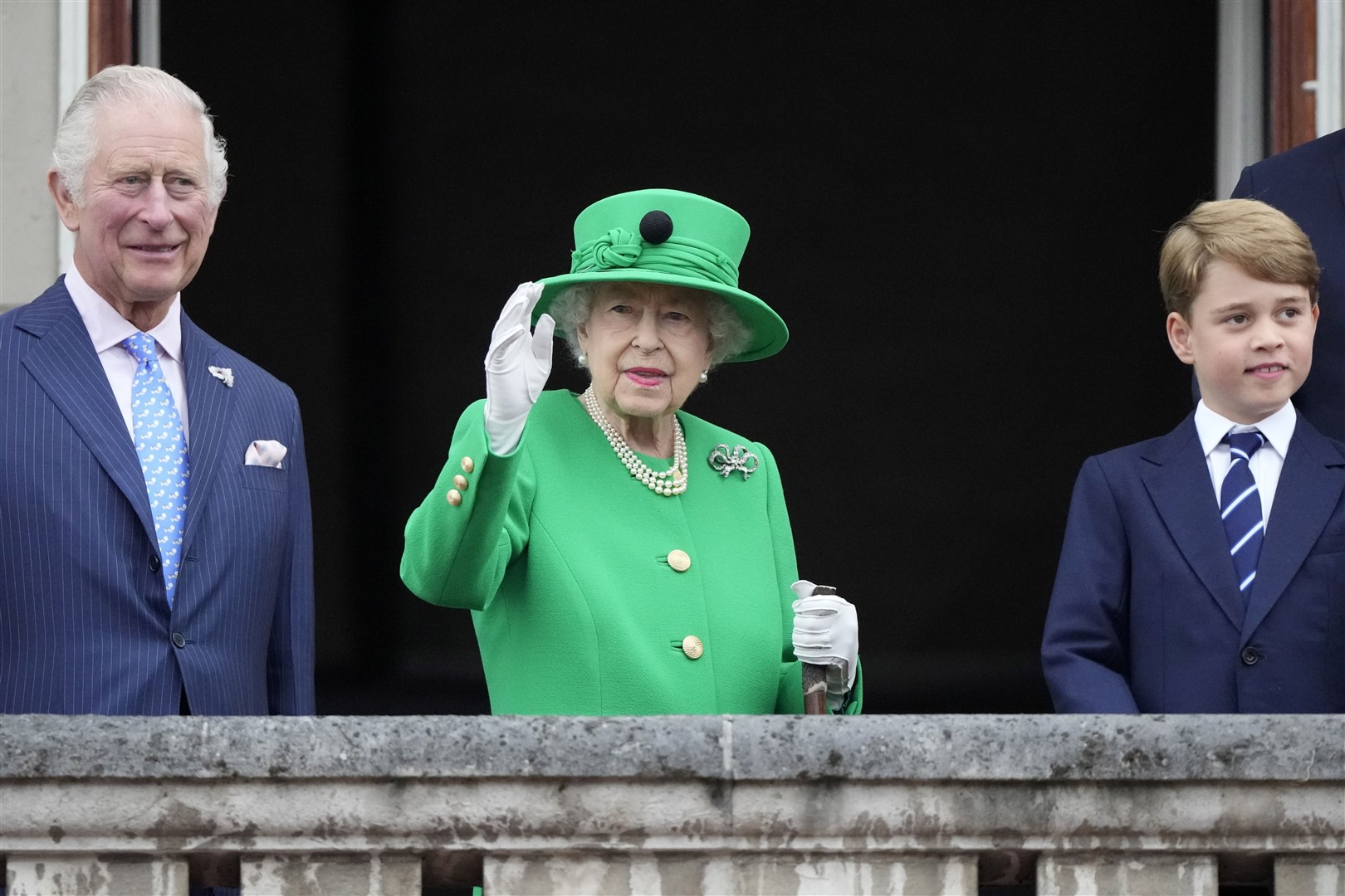 The late Queen with son Charles and great grandson George, on the balcony of Buckingham Palace at the end of the Platinum Jubilee Pageant (Frank Augustein/PA)