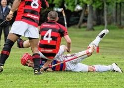 Kingussie’s James Hutchinson goes to ground as he battles for the ball in a hard-fought encounter against Kinlochshiel.