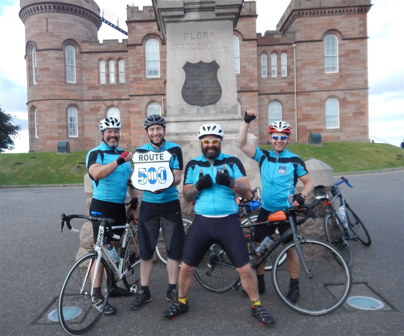 The four finishing riders at Inverness Castle at the end of their 2016 ride.