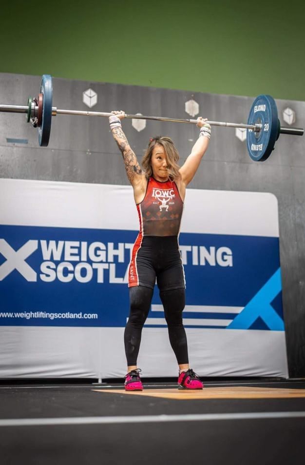 Karen Saint in weight-lifting action.