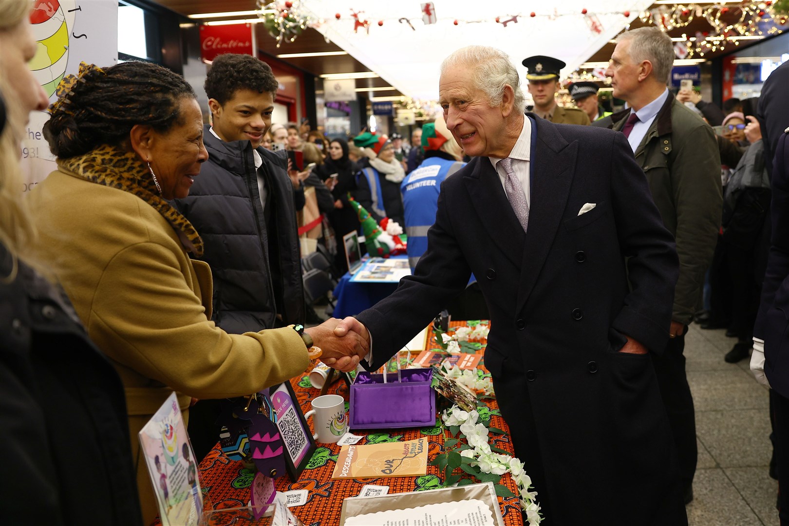 Charles toured the Christmas market (Peter Nicholls/PA)