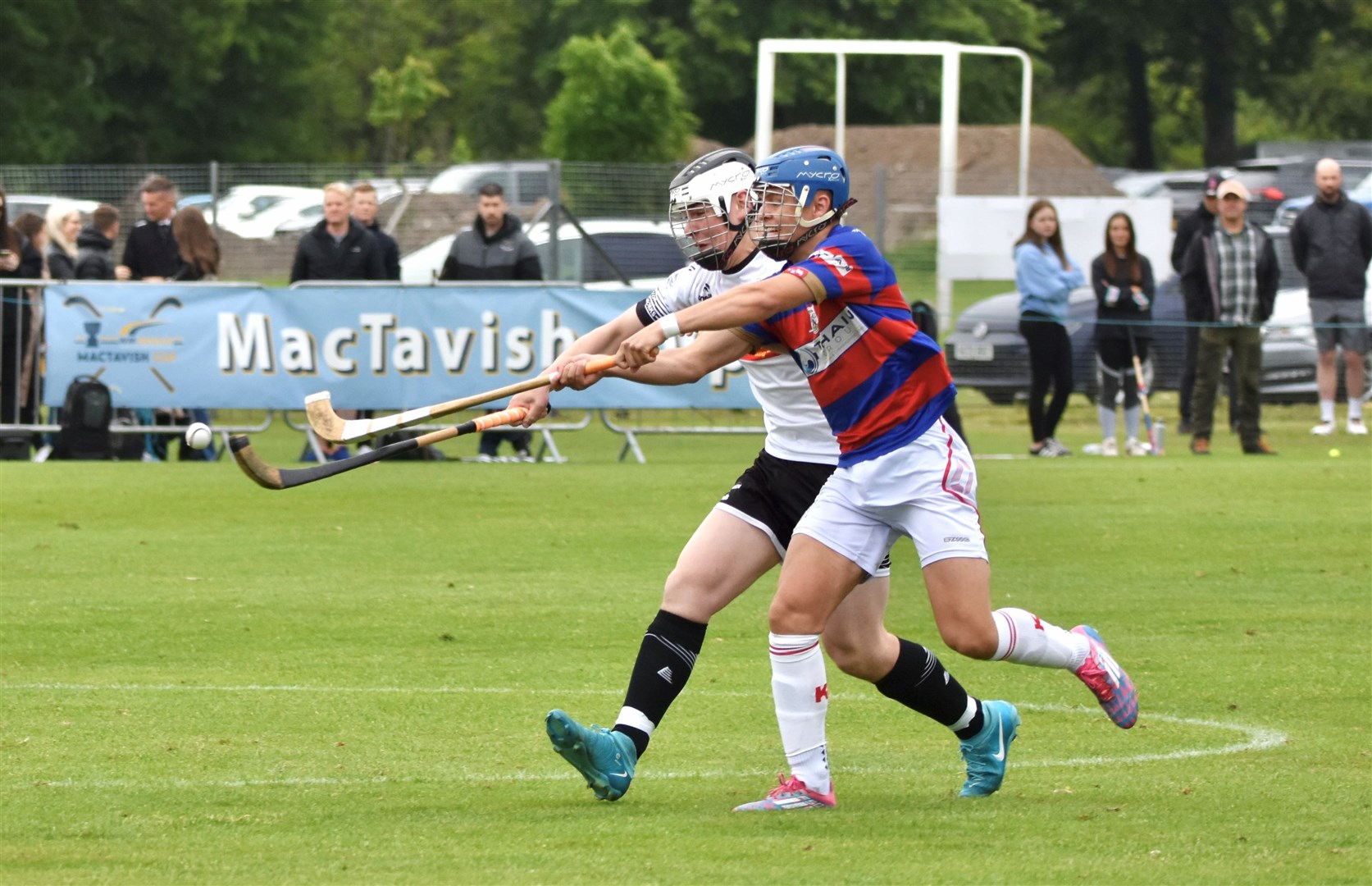 Kingussie's Iain Fraser and Lovat's Joe Embleton reach for the ball. All pictures: Fiona Young.