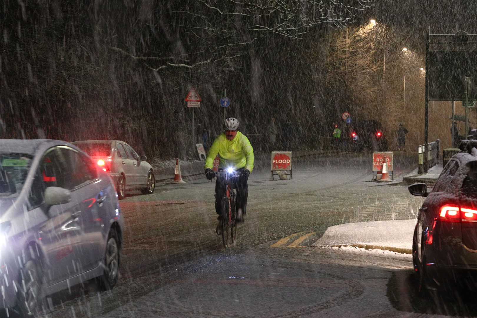 Snow falls in East Didsbury, Manchester, where homes are being evacuated due to risk of flooding (Peter Byrne/PA)