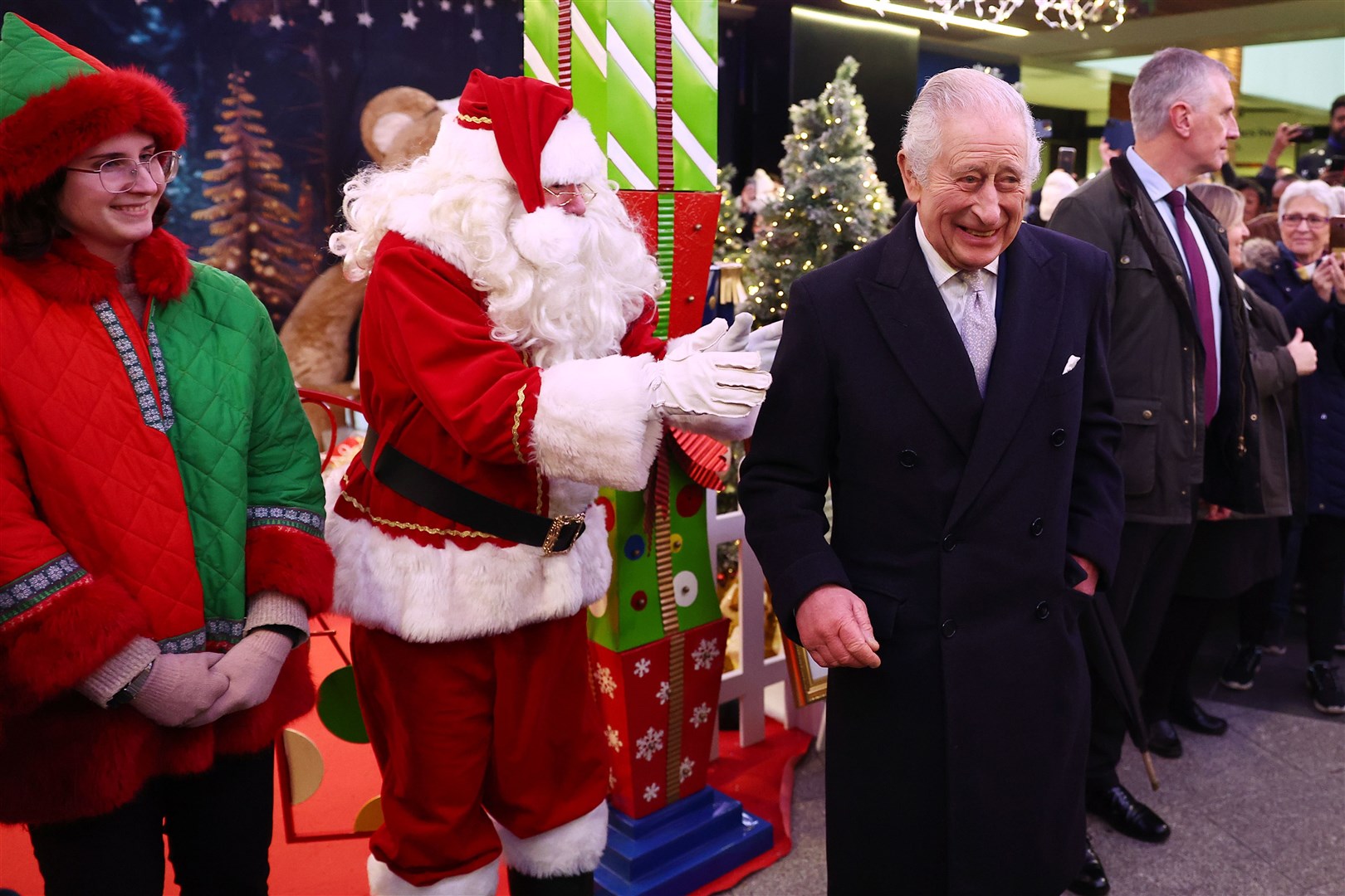 The King met Father Christmas during his visit to Ealing Broadway shopping centre on Thursday (Peter Nicholls/PA)