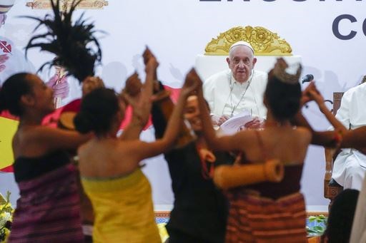 During a visit to East Timor, Francis was welcomed to Dili by young dancers (Gregorio Borgia/AP)