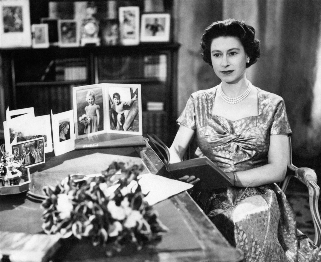 The Queen making the Christmas Day broadcast in 1957 (PA)