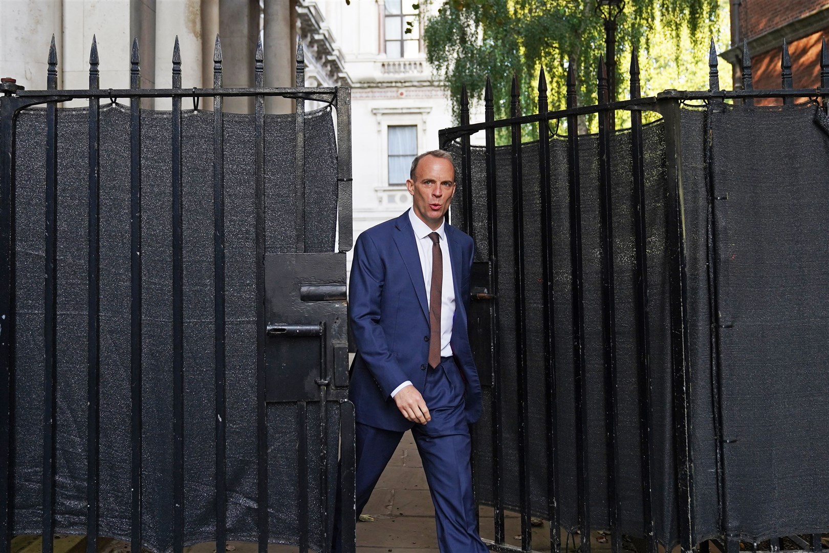 Dominic Raab came under fire for being on holiday amid a crisis on his watch, with criminal barristers voting for an all-out strike as he was on leave (Stefan Rousseau/PA)