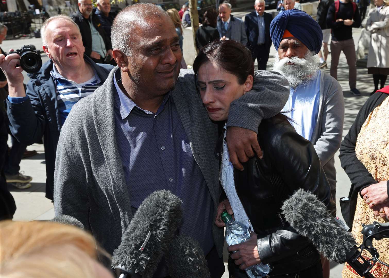 Postmaster Harjinder Butoy (left) outside the Royal Courts of Justice after his conviction was overturned (Yui Mok/PA)