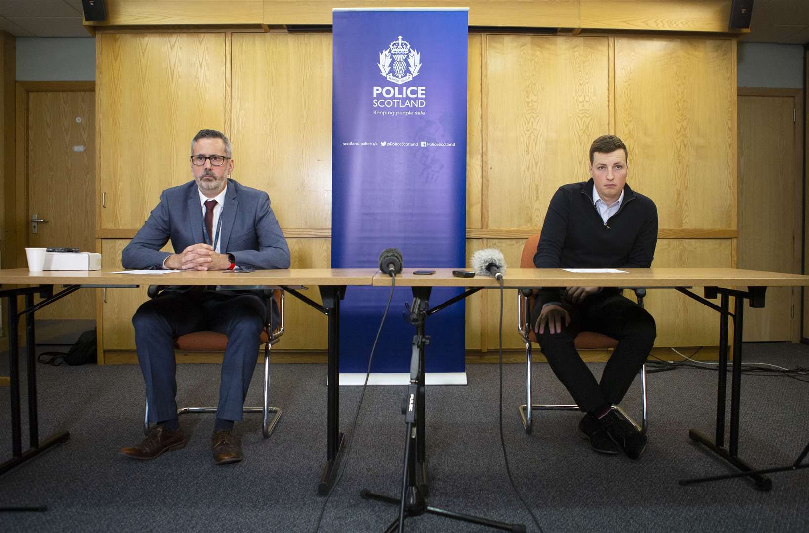 Detective Inspector Gary Winter (left) and Andrew Wilson, son of Alistair Wilson, during a press conference (Jane Barlow/PA)
