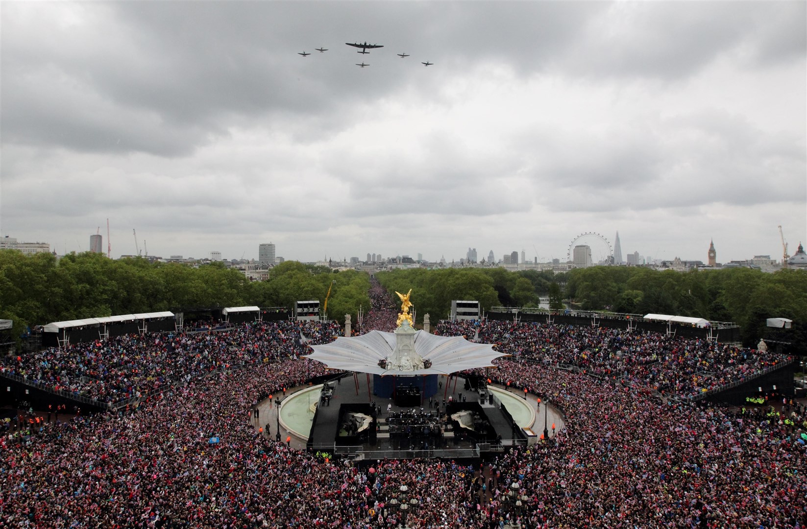 Planes fly overhead during a ceremonial flypast during the Diamond Jubilee celebrations (Steve Parsons/PA)
