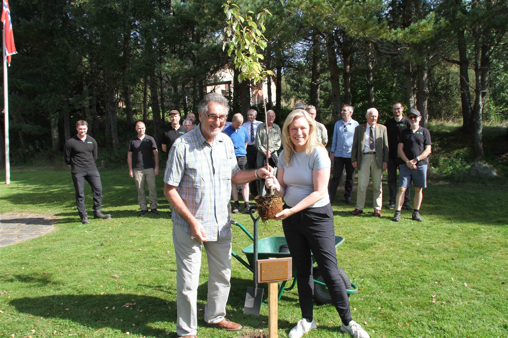 Senior forester Tony Hinde came 'out of retirement' today to join environment minister Gillian Martin MSP in planting the birthday tree which marked a century of public ownership in Glenmore Forest Park. Picture: Frances Porter.