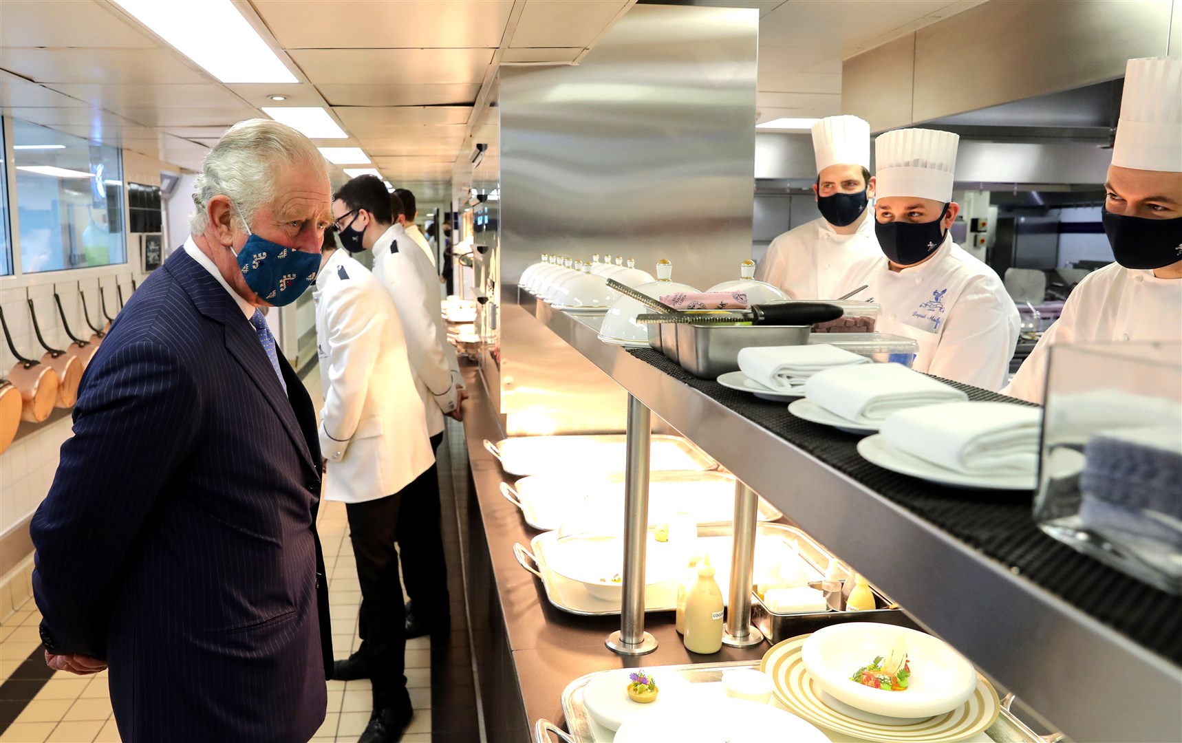 Charles casts his eye over Ritz staff at work (Chris Jackson/PA)