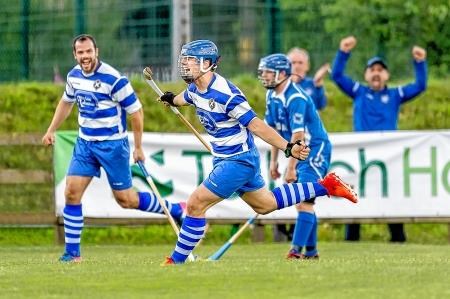 Ewen Fraser opens the scoring for Newtonmore in the Camanachd Cup semi final. Picture: Neil Paterson