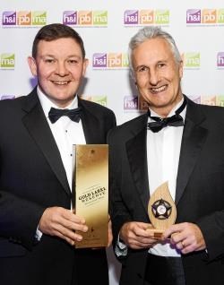 Strathy editor Gavin Musgrove collects the award from Mr Miller