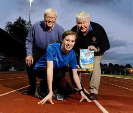 Abbie McNally with Rotary sports convenor Jim Robb (left) and president Donald Robertson.