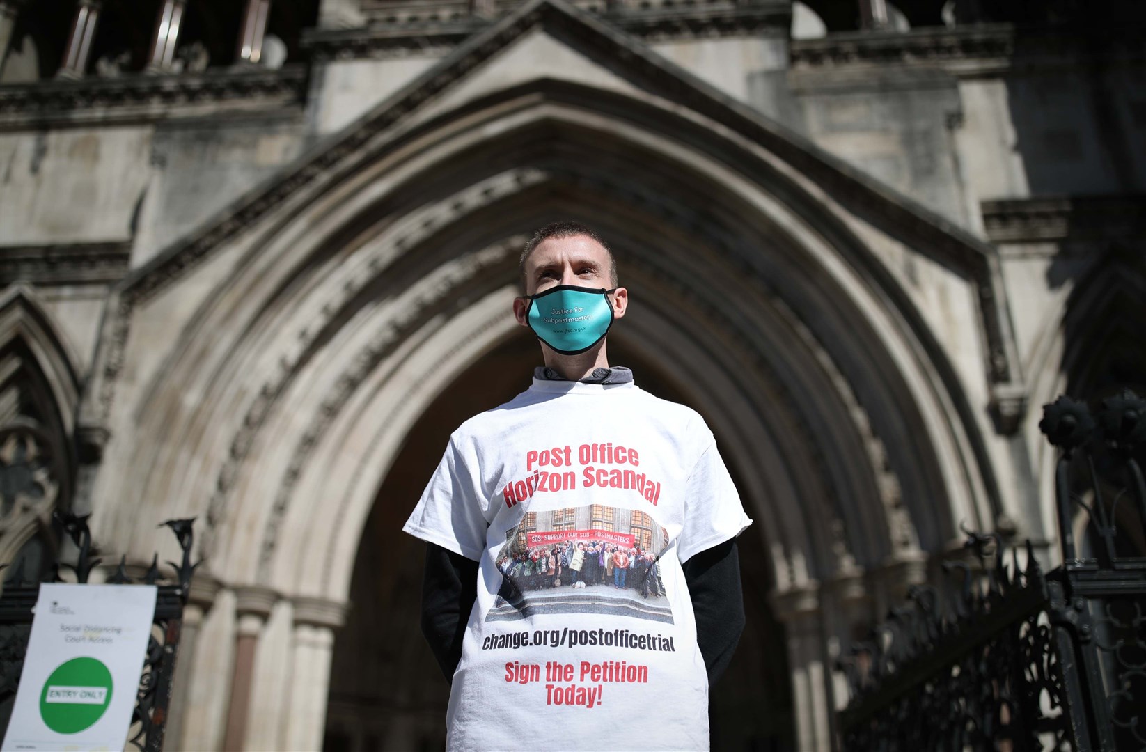 Protesters outside the Royal Courts of Justice (Yui Mok/PA)