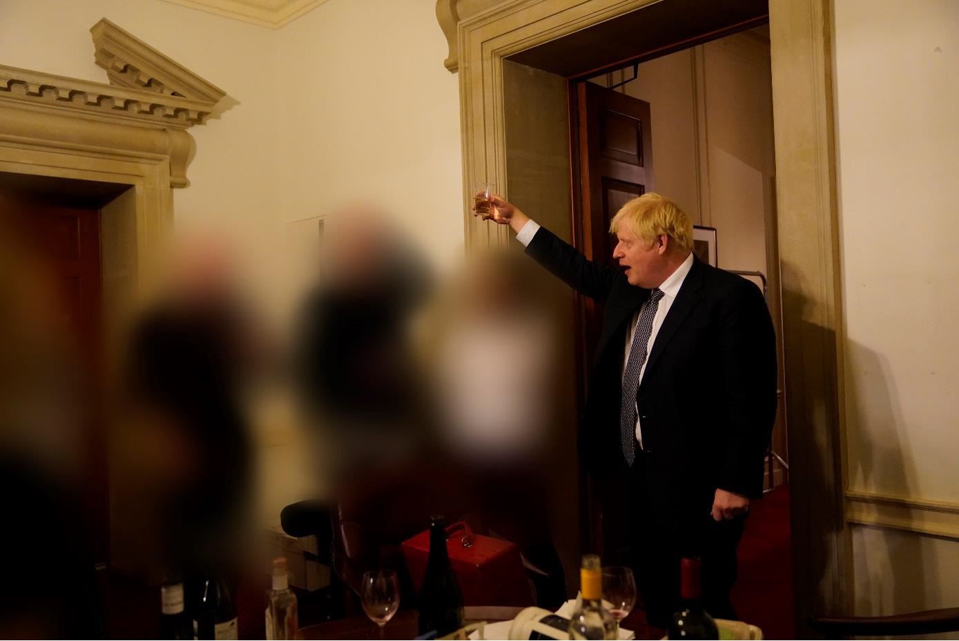 Boris Johnson pictured at a lockdown-busting gathering in No 10 for the departure of a special adviser (Sue Gray Report/Cabinet Office/PA)