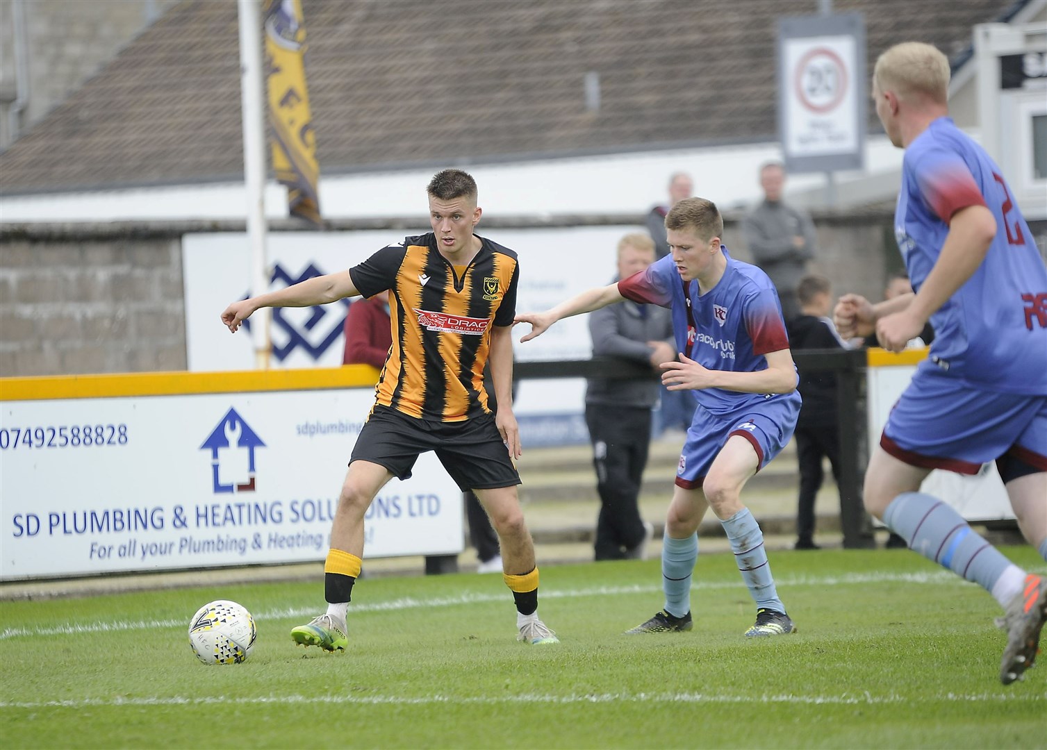 Angus Grant (left) scored five first half goals for Huntly.