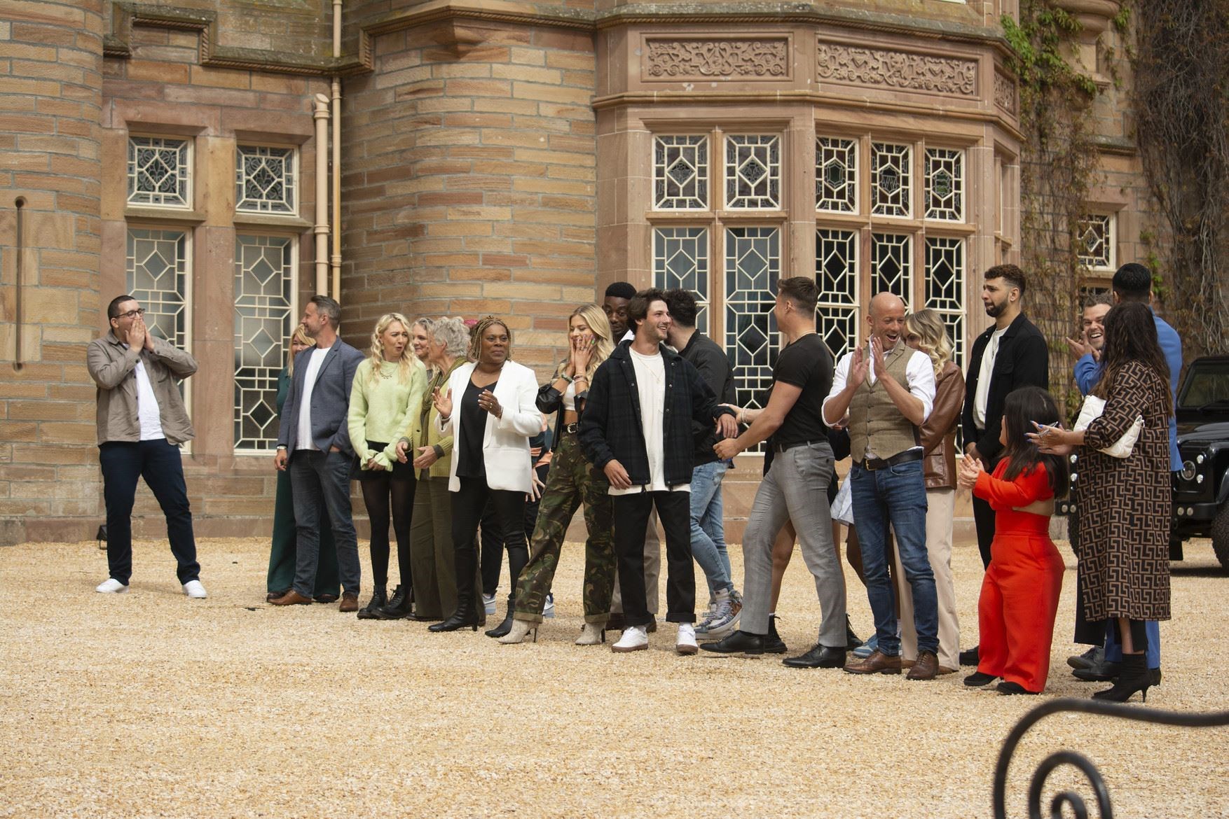 Contestants in The Traitors line-up outside Ardross Castle on their arrival to the stunning Highland venue – with a huge shock immediately awaiting...(l-r) Rayan, Hannah, Keiran, Maddy, Nicky, Andrea, Tom, Fay, Alex, Amos, Matt, Wilfred, Aaron, John, Claire, Theo, Meryl, Ivan, Imran, Amanda. Picture: BBC