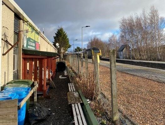 Noon today: "Lots of strange people about dragging bags and train parked up in the station," said neighbour Ruaridh Ormiston, at Highland Horse Fun.