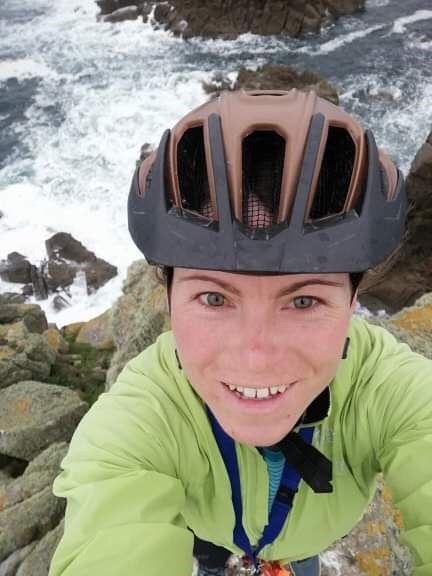 Sarah Crowsley finds time for a gravity-defying selfie at the start of the relay.