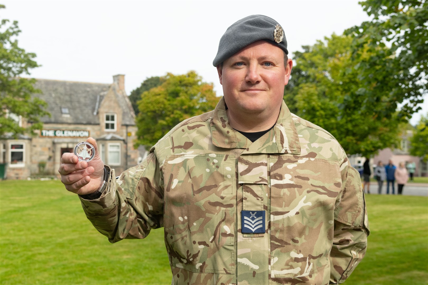 Stefan Devlin with the battle coin he later handed to King Charles III in Tomintoul. Picture: Beth Taylor.