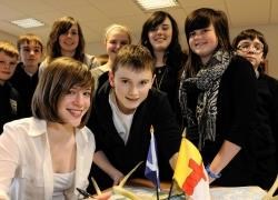 Rebecca Ross (16) and Calum Brindle (13) plot their route with fellow pupils who will be taking part in the exchange trip.