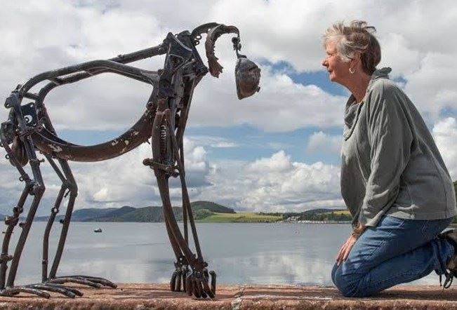 THE ARTIST: Helen Dennerly with one of her evocative pieces