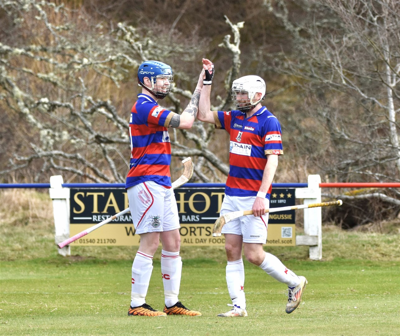 Ruaridh Anderson (right) celebrates one of his goals with Dylan Borthwick. Picture: Fiona Young.