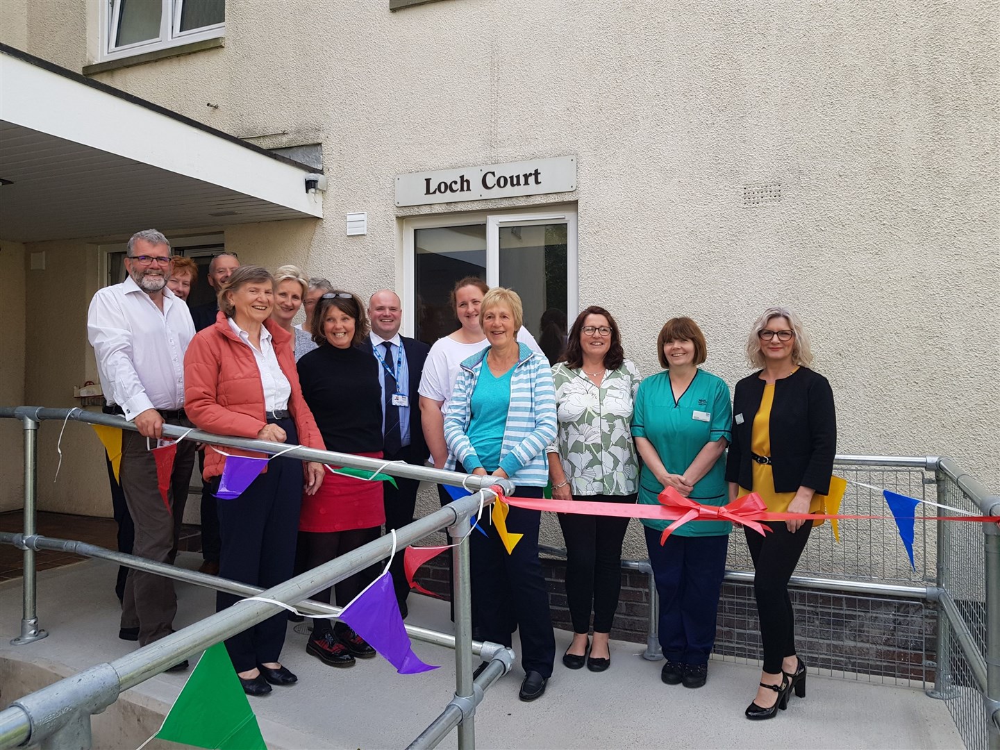 NHS Highland's accommodation team with Pat Dobbie (second left), Linda Burgin (fourth right) and Iain Stewart (centre).