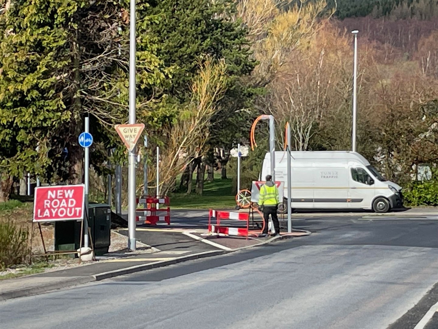 One of the sets of traffic lights being installed at the end of Dalfaber Drive in Aviemore.