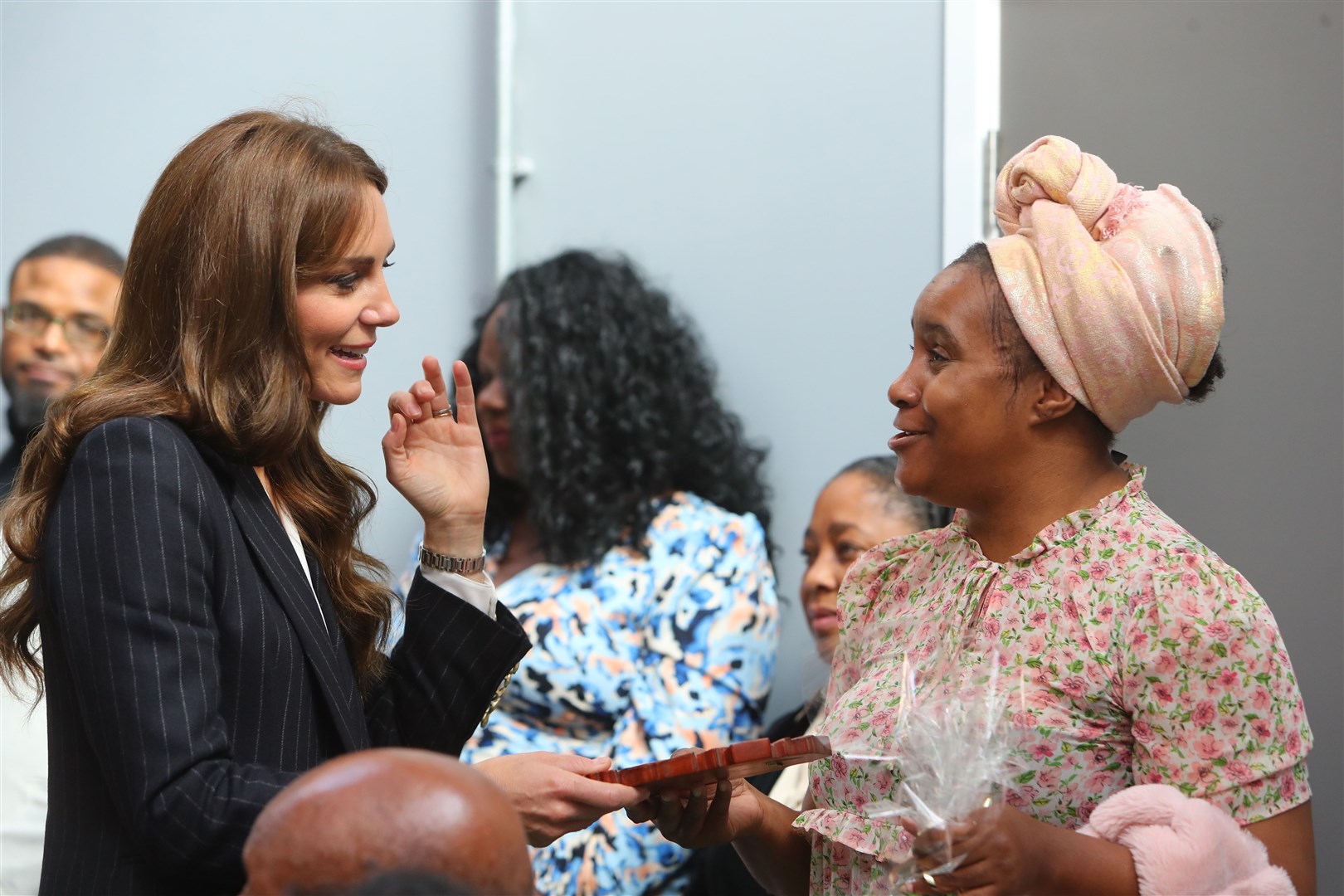 The royal couple heard about the contribution the Windrush generation has had on the Welsh community (Geoff Caddick/PA)