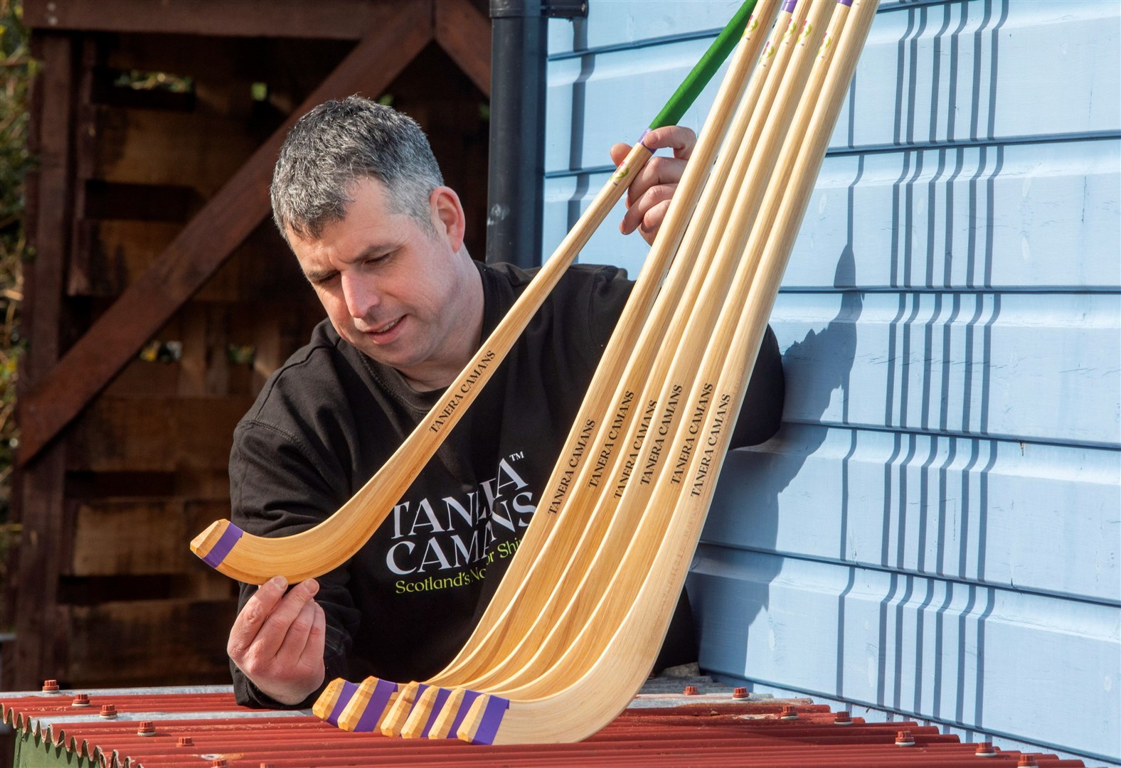 Alan MacPherson, of Tanera Camans, inspects his latest camans.
