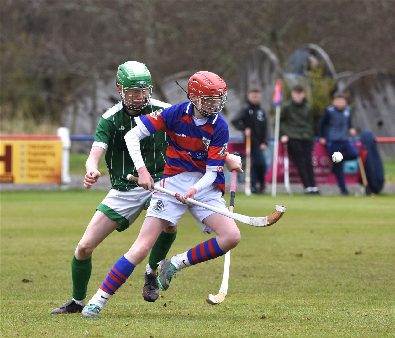Kingussie’s Rory Munro turns away from his marker. Picture: Fiona Young.