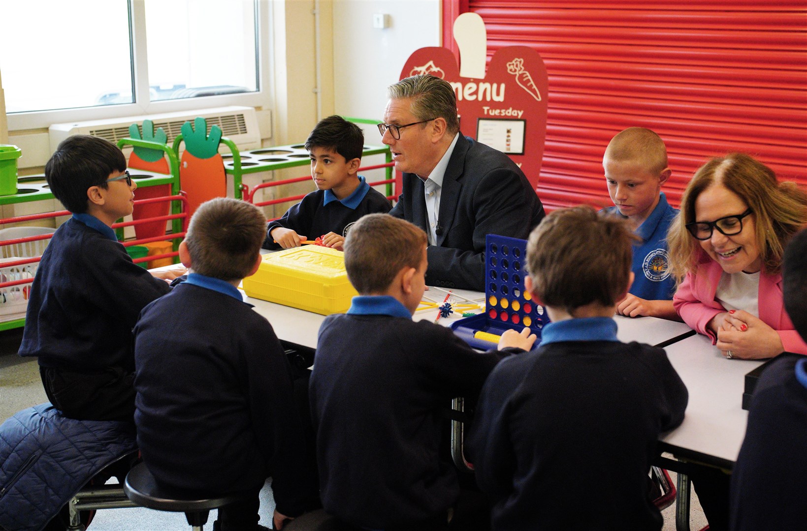 Prime Minister Sir Keir Starmer speaks to children during a visit to St Michael’s Junior School in Bath (Ben Birchall/PA)