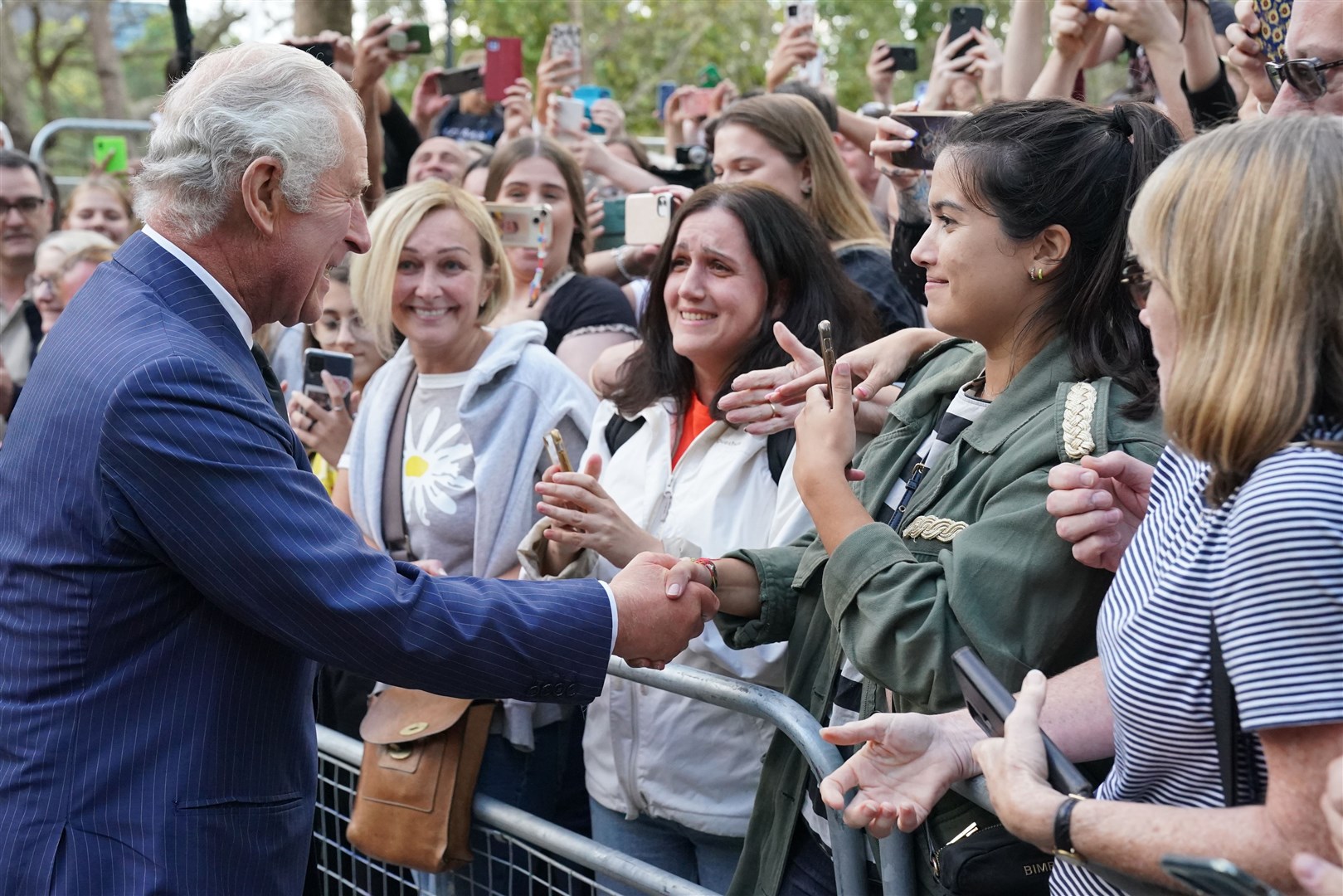 The King meeting well-wishers as he returns to Clarence House from Buckingham Palace (Jonathan Brady/PA)