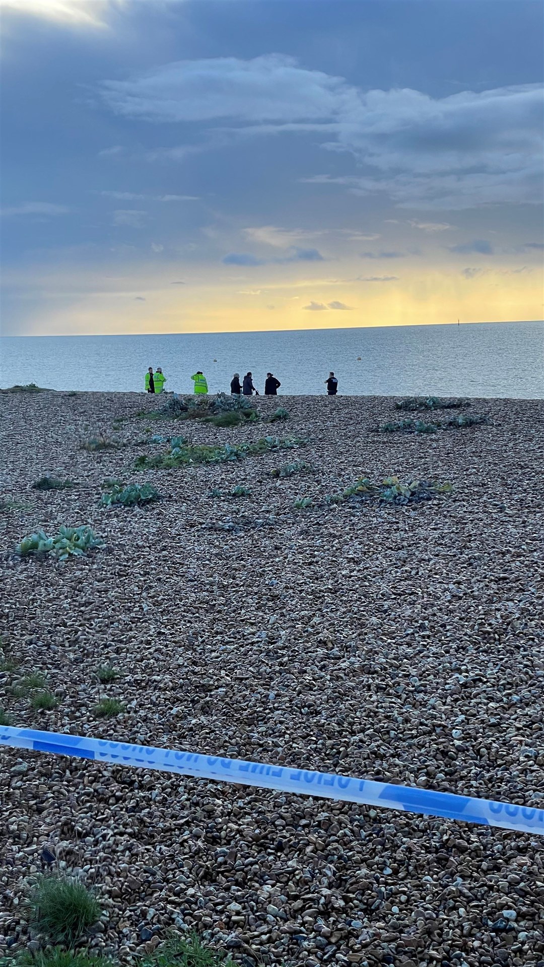 Police examine the scene after a body was found on the beach in Southsea, Hampshire (Ben Mitchell/PA)