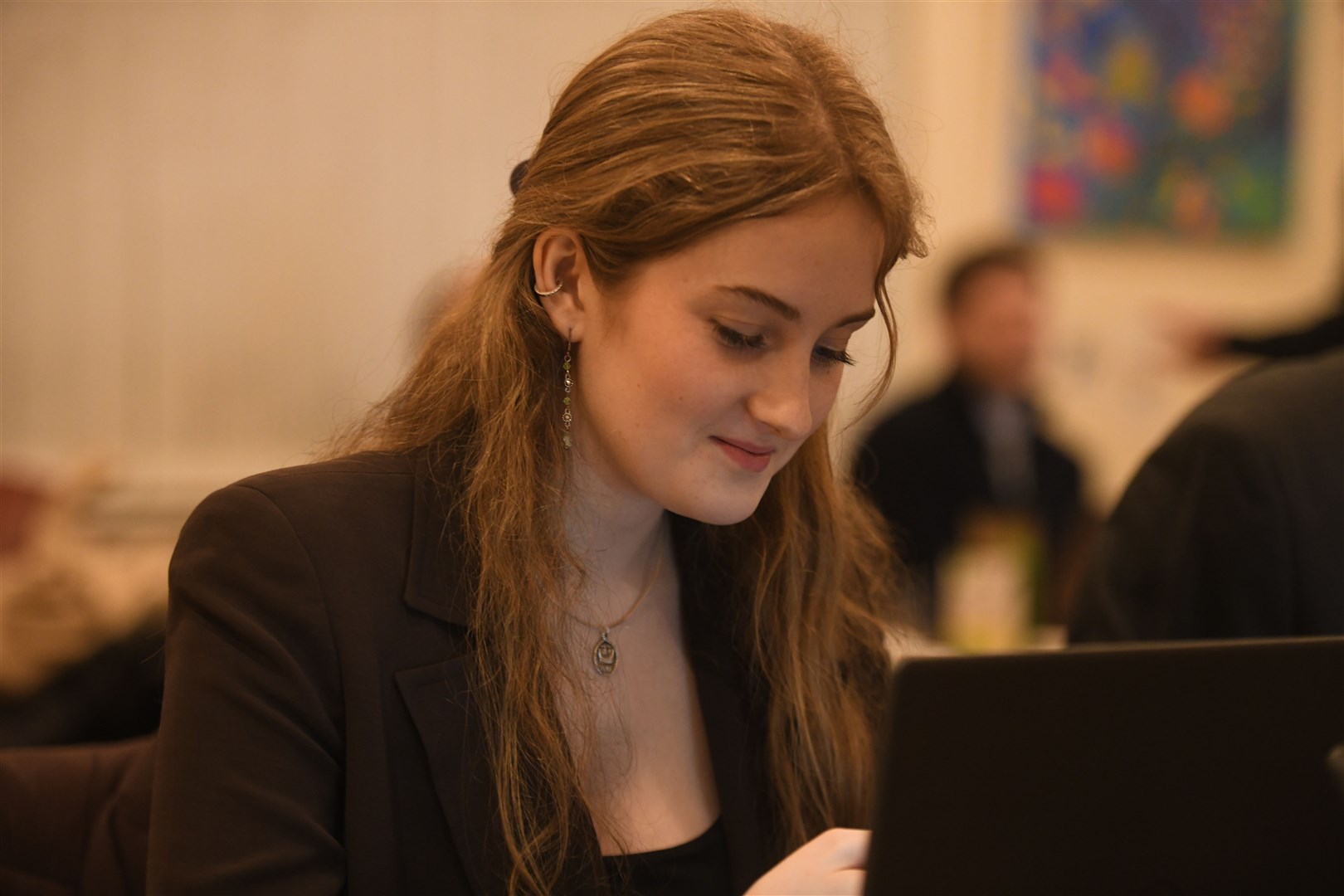 Iona MacDonald working at the Inverness Courier Leadership Debate. Picture: James Mackenzie.