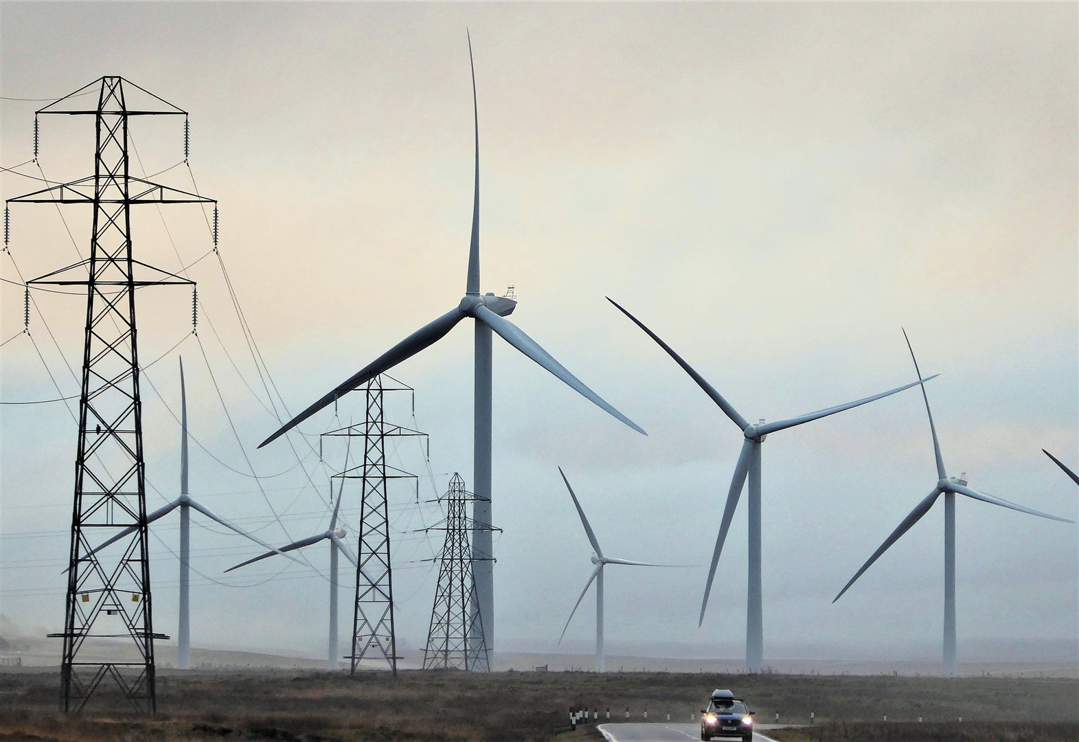 Wind turbines and pylons at the Causewaymire in Caithness. Picture: DGS