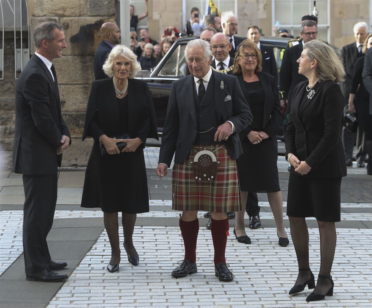 The King, accompanied by the Queen Consort arrived in Holyrood for the first time since taking the throne (Fraser Bremner/PA)