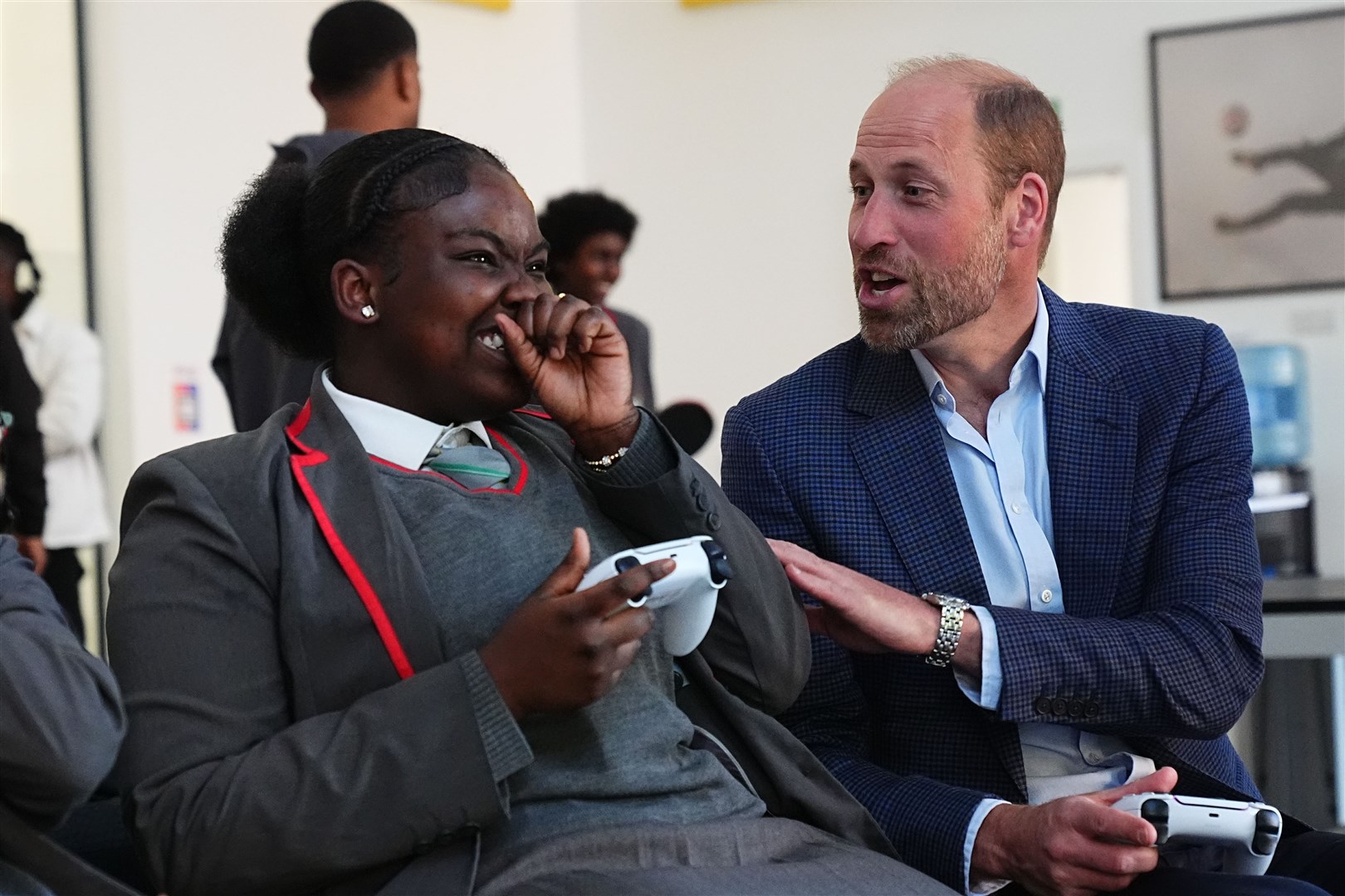 The Prince of Wales plays a computer game (Aaron Chown/PA)