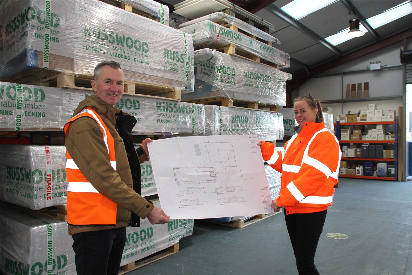 Russwood: John Russell with operations assistant Eve Wilkinson present the expansion plans which received a boost from HIE.