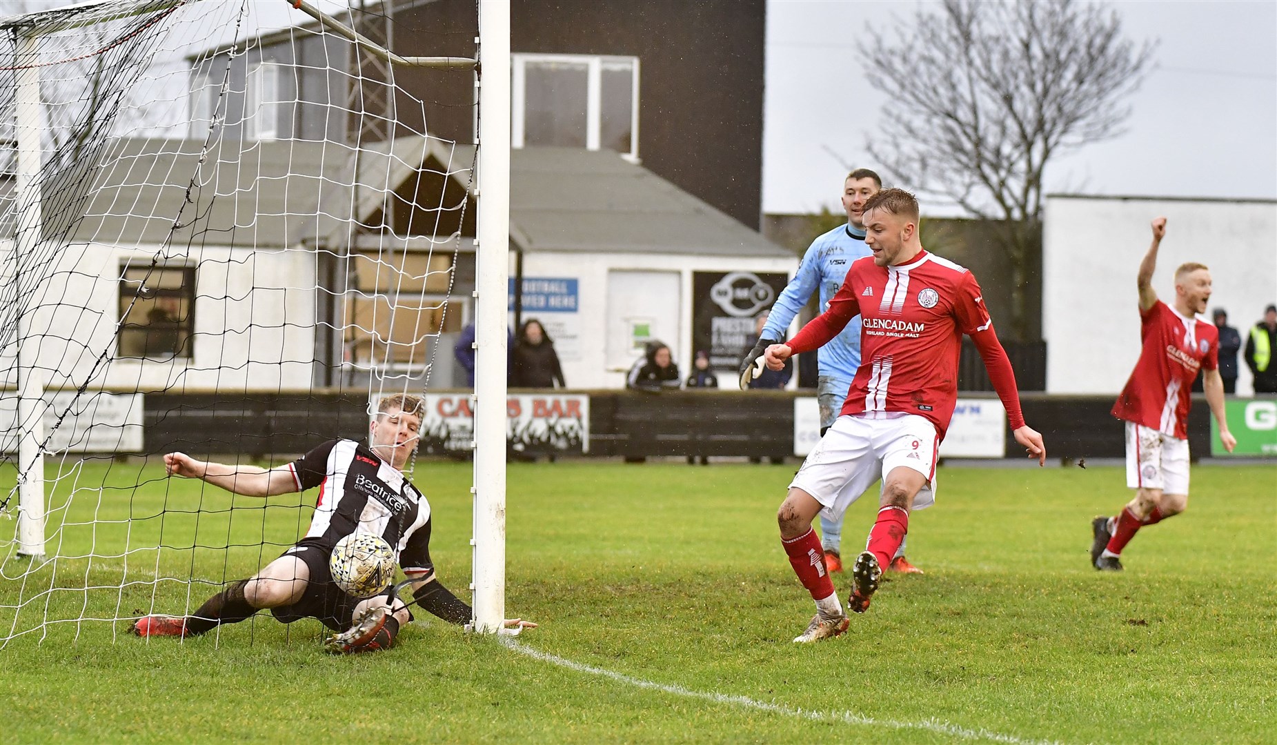 Wick defender Ross Allan can do nothing to prevent ball crossing the line for Brechin's second goal of the afternoon. Photo: Melanie Roger