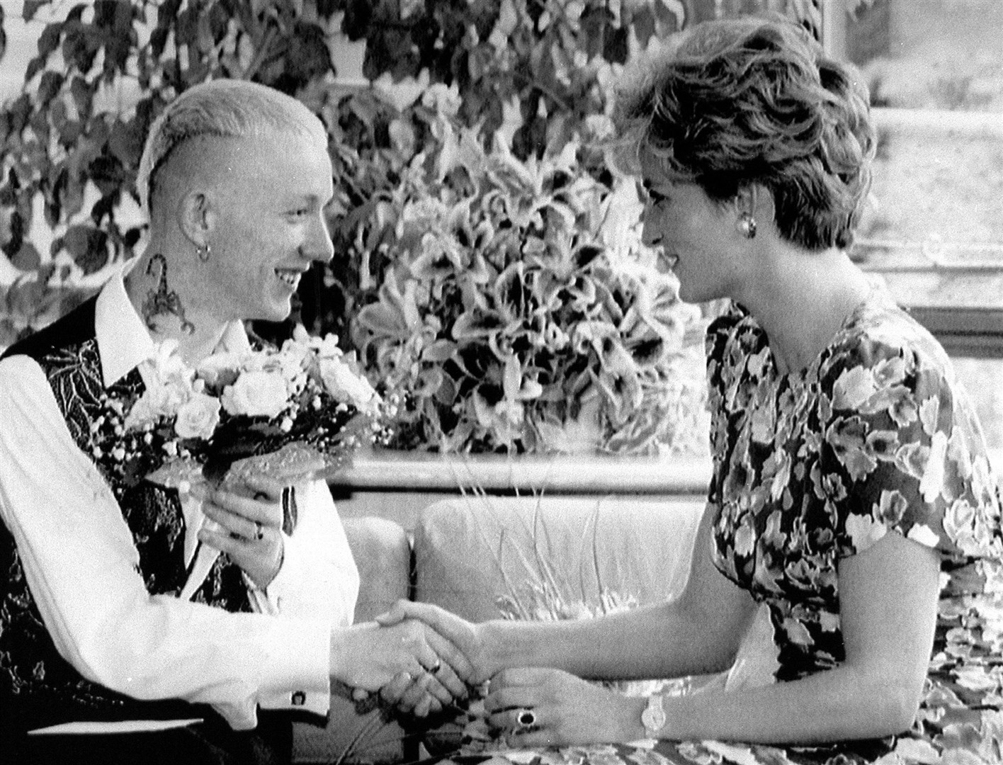The Princess of Wales shaking hands with William Drake, a patient at the London Lighthouse Aids Centre (PA)