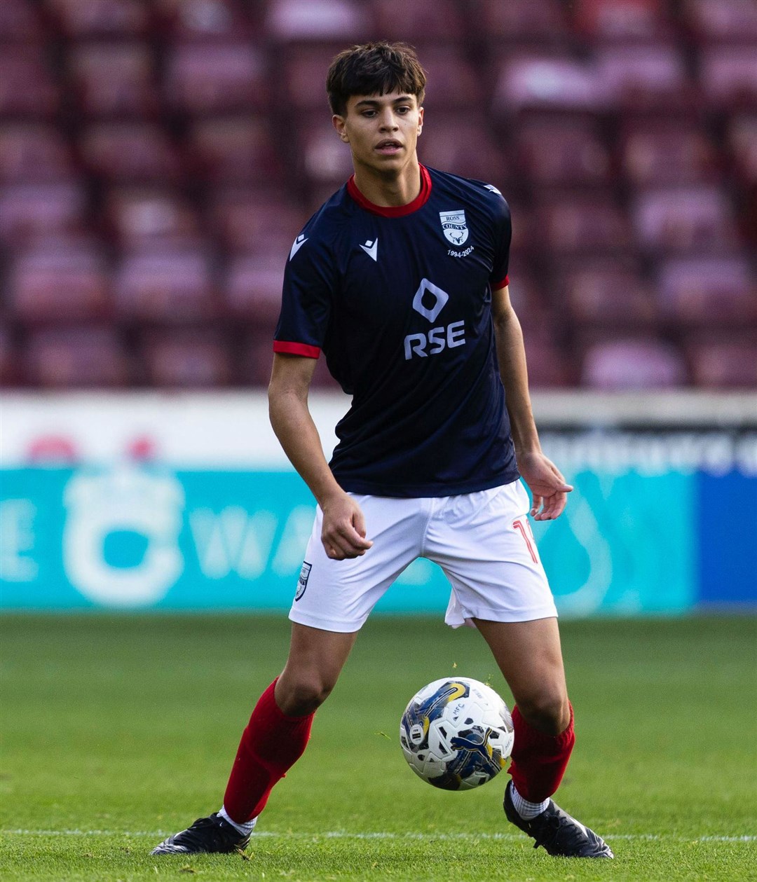 Torran Lambie in action for Ross County.