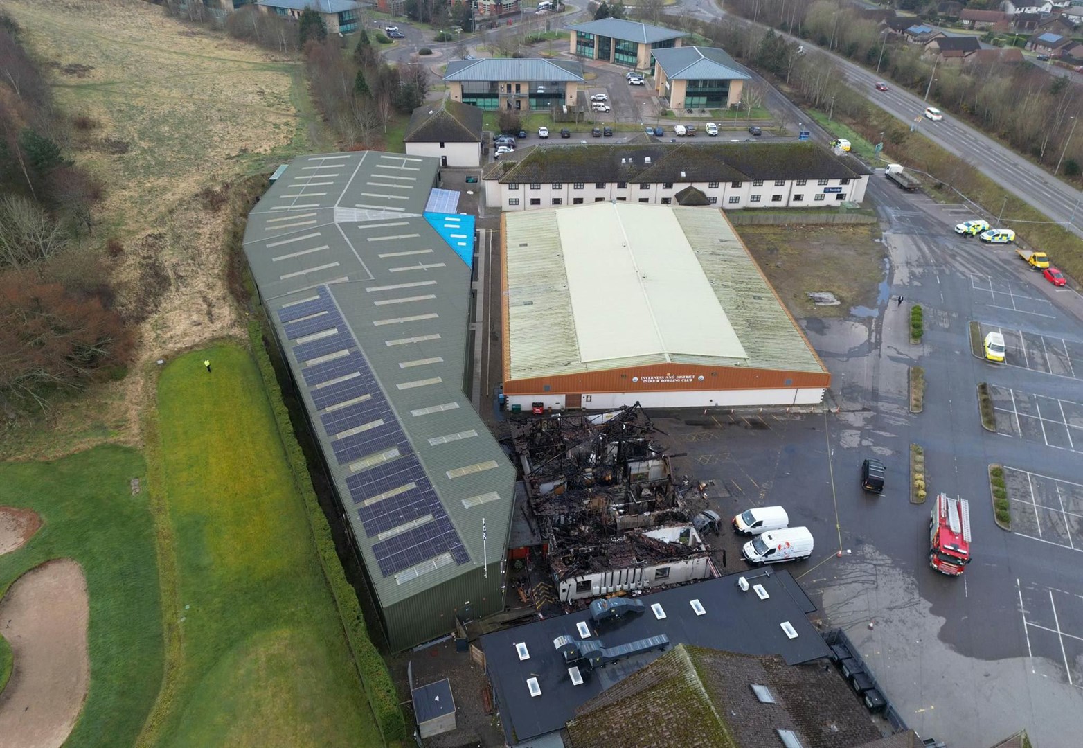 Drone footage reveals the scale of the damage and how close it came to neighbouring buildings. Picture: Walter Geddes.