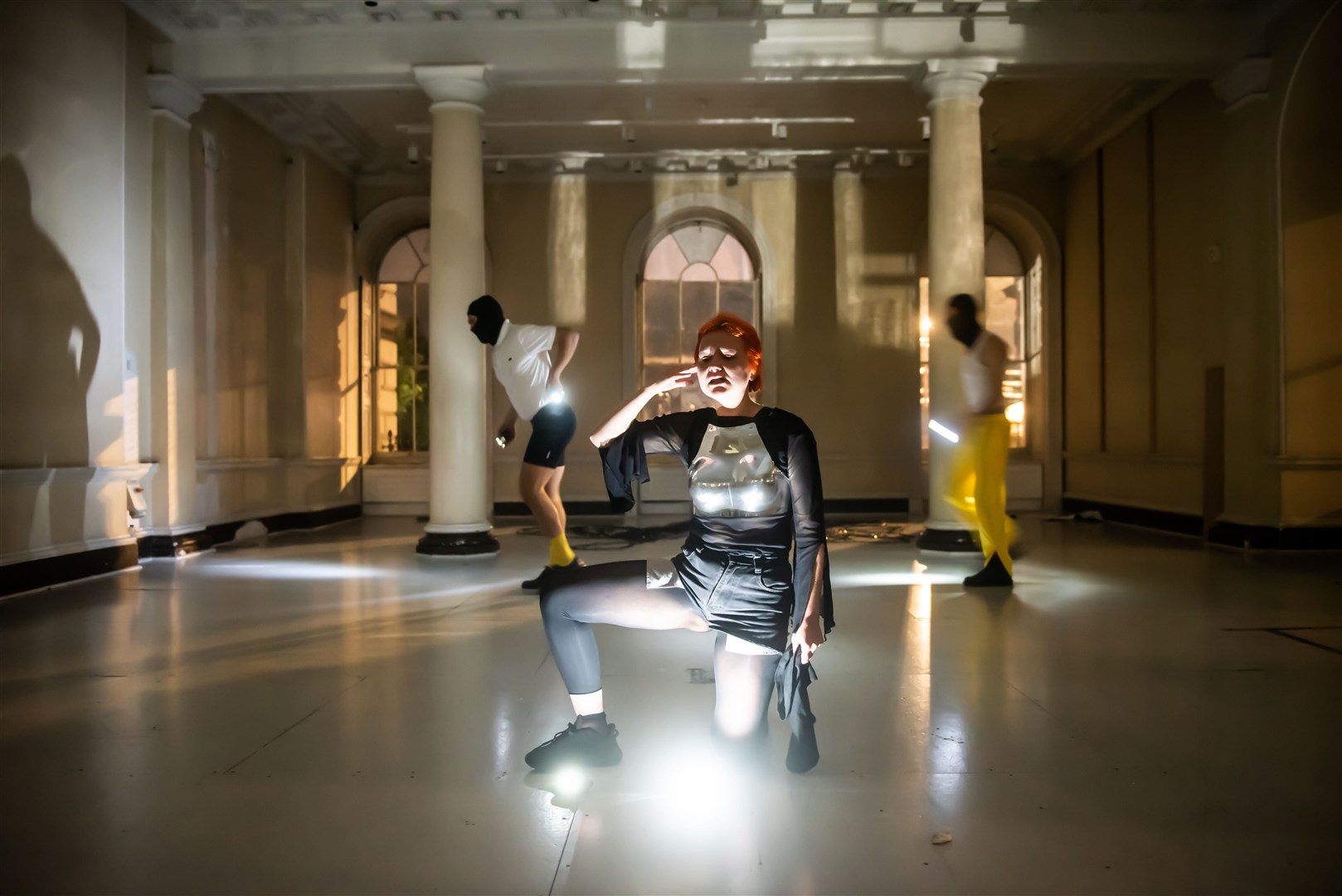 Members of Hooligan Art community performing (Lidia Crisafulli/PA)