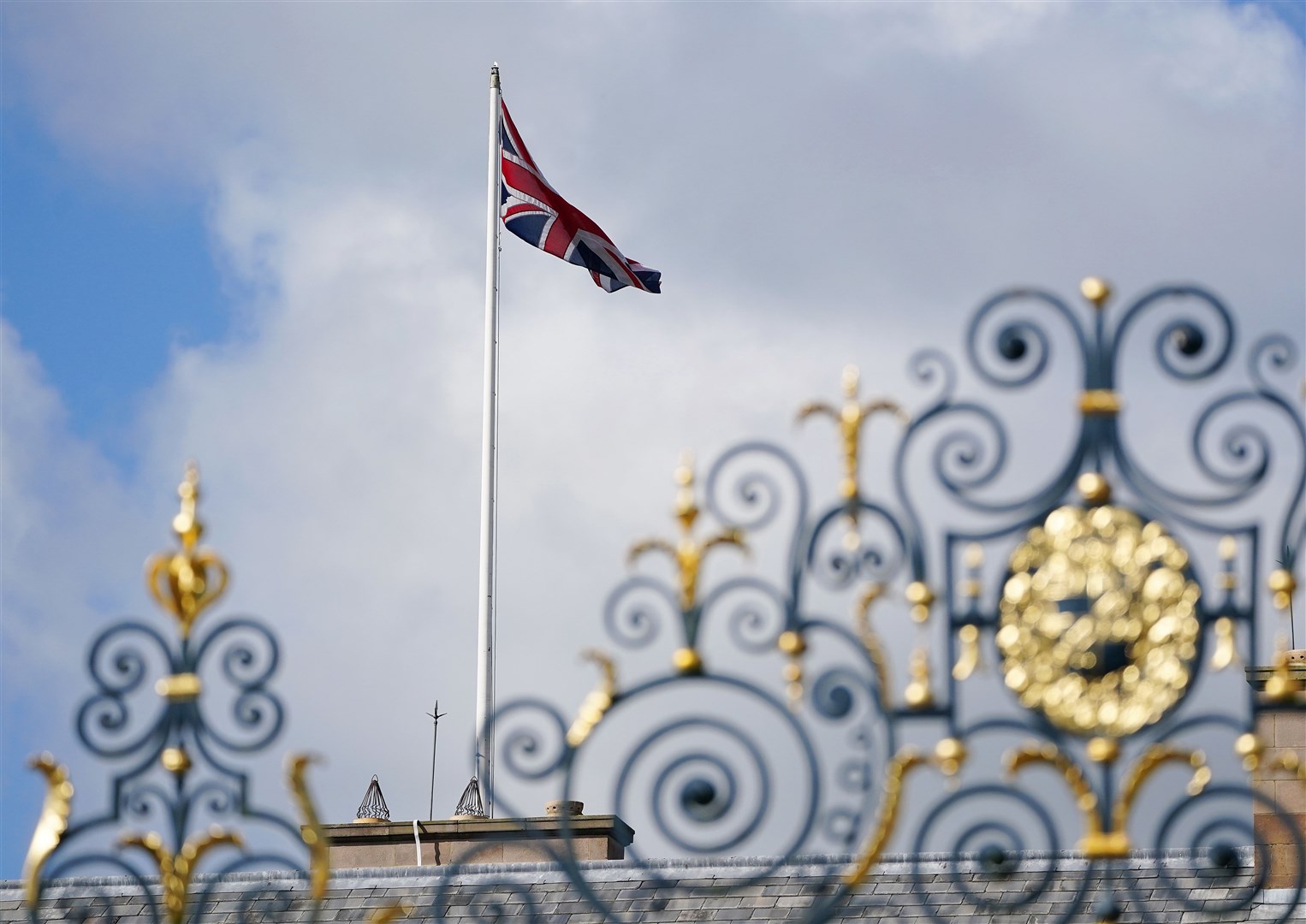The Union flag flies at full mast at Hillsborough Castle, Belfast, after the Proclamation of Accession of King Charles III (Brian Lawless/PA)