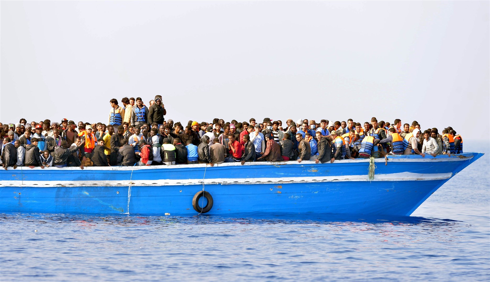 Migrants stranded on a boat, 30 miles off the Libyan coast (Rowan Griffiths/Daily Mirror/PA)