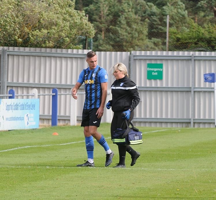 Thistle defender Jordan Laidlaw has to leave the pitch through injury accompanied by the club's new sports therapist Beccy Mussett. Picture: Stewart Grant.